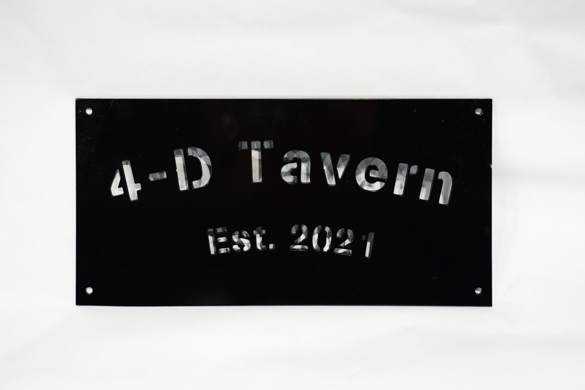 Custom metal sign for a man cave that they call the 4-D Tavern